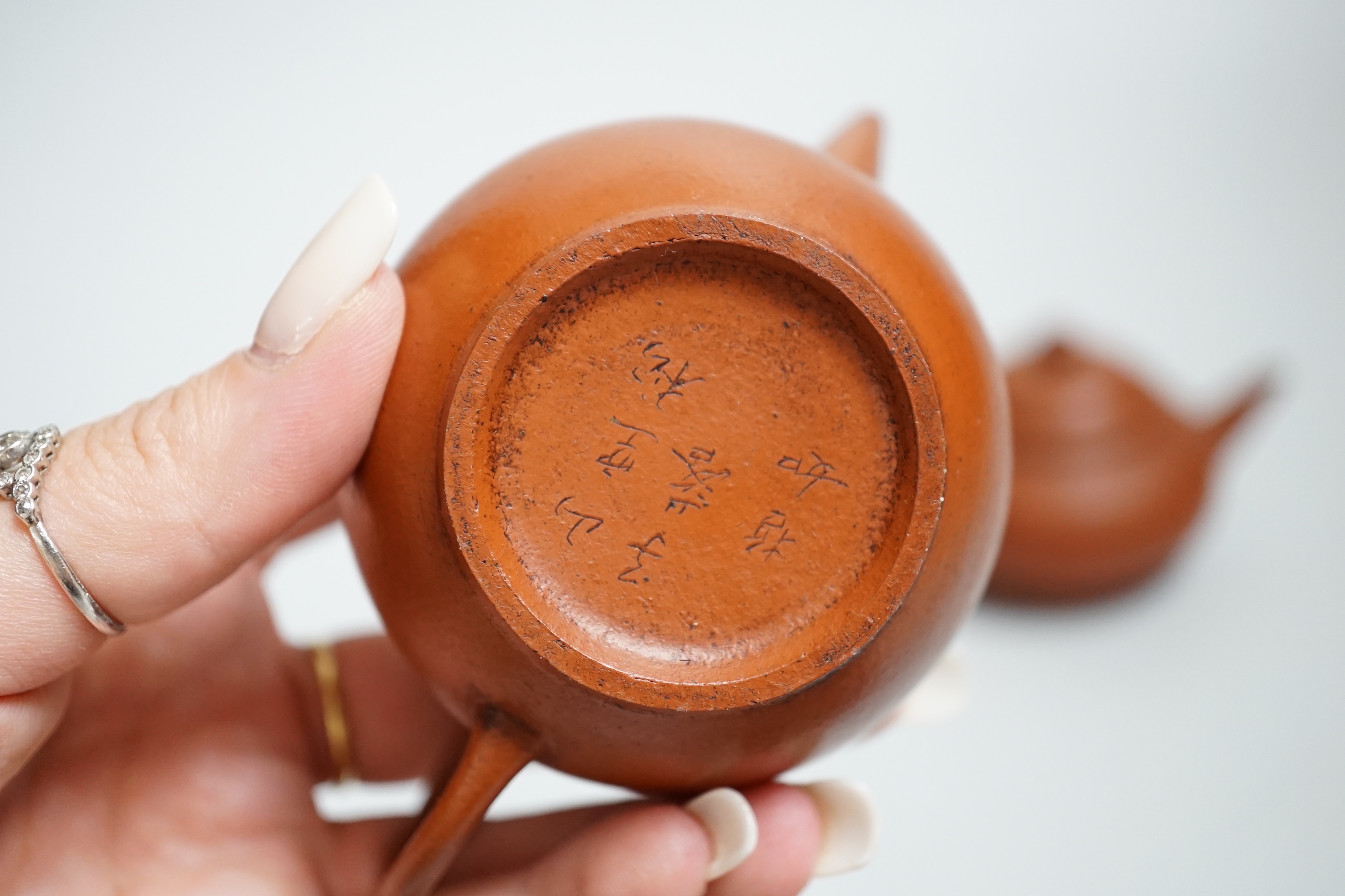 Five Chinese Yixing small teapots, probably 19th/20th century, one cover lacking